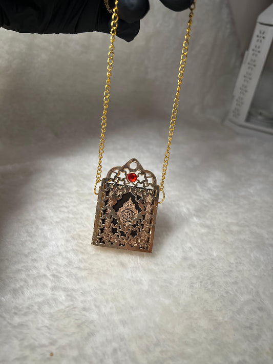 mini coran avec pendentif
